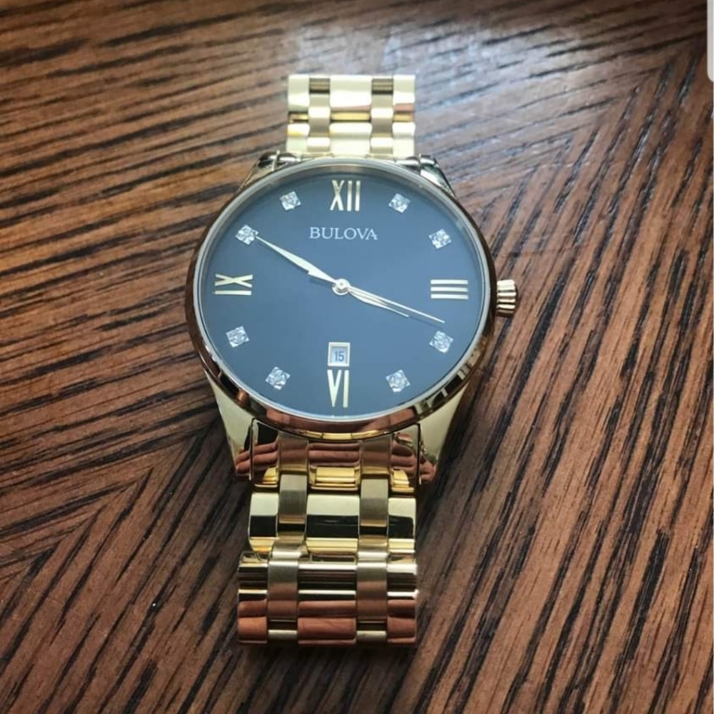Gold Bulova watch